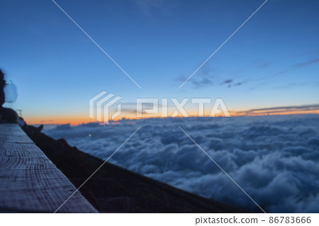The sea of clouds at sunrise seen when climbing Mt. Fuji The sea of clouds at sunrise seen when climbing Mt. Fuji 86783666