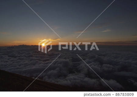 A spectacular view of the sea of clouds seen when climbing Mt. Fuji A spectacular view of the sea of clouds seen when climbing Mt. Fuji 86783809
