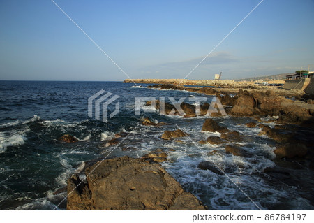 Cretan sea waves crashing against the rocks on Rethymno, Crete, Greece. High quality photo Cretan sea waves crashing against the rocks on Rethymno, Crete, Greece. High quality photo 86784197