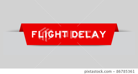 Red color inserted label with word flight delay on gray background 86785361