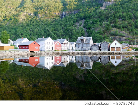 Norwegian Laerdal Landscape reflected on the surface of the water Norwegian Laerdal Landscape reflected on the surface of the water 86785748