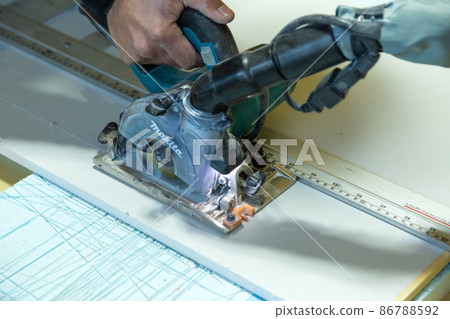 Carpenter doing new detached house construction work Carpenter doing new detached house construction work 86788592