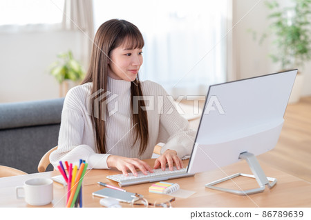 Young woman learning remotely Young woman learning remotely 86789639