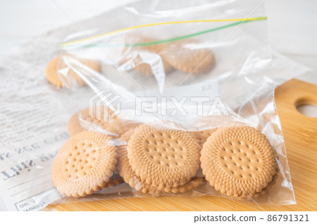 Cookies in a zippered plastic bag for crushing Cookies in a zippered plastic bag for crushing 86791321