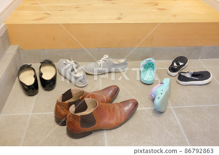 The shoes on the front door that were taken off The shoes on the front door that were taken off 86792863