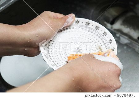 Washing dishes Washing dishes 86794973