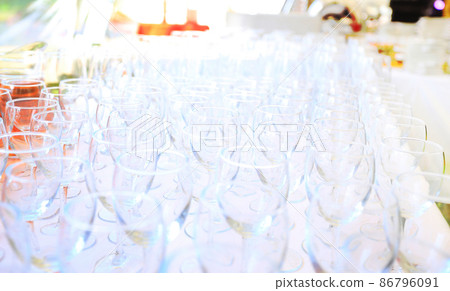 Empty wine glasses in the garden party Empty wine glasses in the garden party 86796091