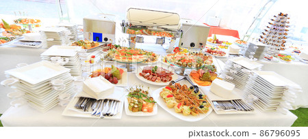 catering table set service with silverware and glass stemware at restaurant before party catering table set service with silverware and glass stemware at restaurant before party 86796095