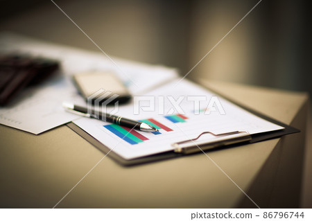 financial charts and graphs on the table financial charts and graphs on the table 86796744