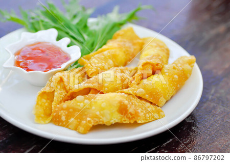 fried wonton, deep fried wonton or fried dumpling or deep fried dumpling 86797202