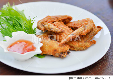 deep fried chicken , fried chicken or chicken wings deep fried chicken , fried chicken or chicken wings 86797203
