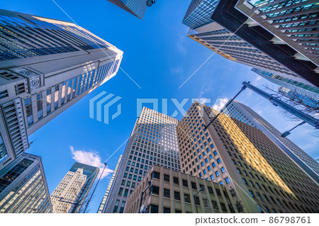 Tokyo cityscape of Japan: View of office buildings (Otemachi Nomura Building on the upper left) from the intersection in front of Otemachi Station 86798761