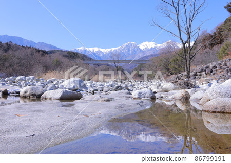 Central Alps and Yotagiri River in winter Central Alps and Yotagiri River in winter 86799191