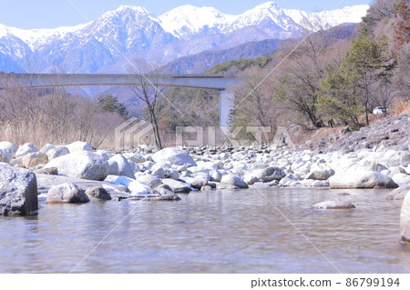 Central Alps and Yotagiri River in winter Central Alps and Yotagiri River in winter 86799194
