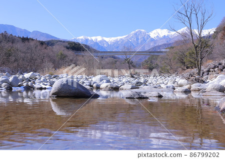 Central Alps and Yotagiri River in winter Central Alps and Yotagiri River in winter 86799202