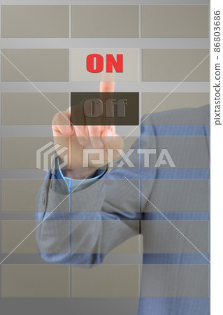 Thumb clicks on the button. 86803686