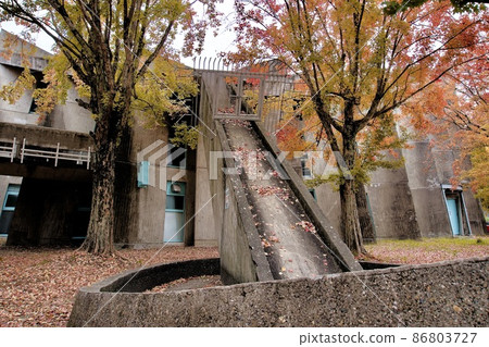 A sliding platform, a gutter, a reservoir, or some other equipment that extends from the gymnasium 86803727