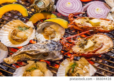 Seafood barbecue at campsite 86804416