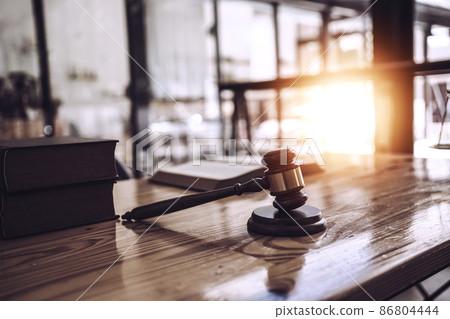 Close up wooden gavel and book of law put on desk table. 86804444