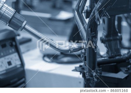 The automatic welding robot working with automotive parts assembly processing. The automatic welding robot working with automotive parts assembly processing. 86805168