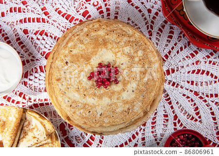 Russian pancake blini with berries and sour cream Russian pancake blini with berries and sour cream 86806961
