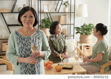 Senior Woman with Glass on Wine 86808238