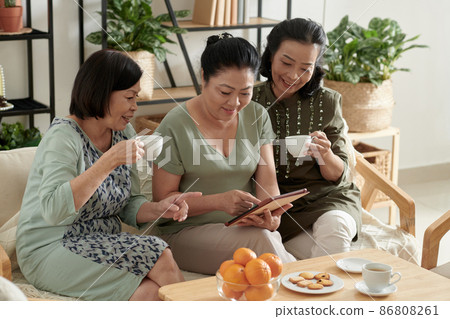 Senior Women Gathered at Home 86808261