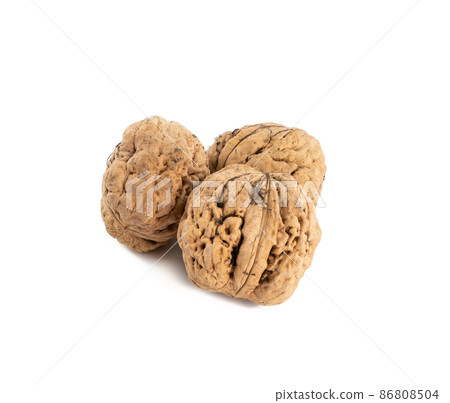 Walnuts isolated on white background, close up Walnuts isolated on white background, close up 86808504