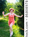 Laughing red haired girl on a sunny day having fun 86808978