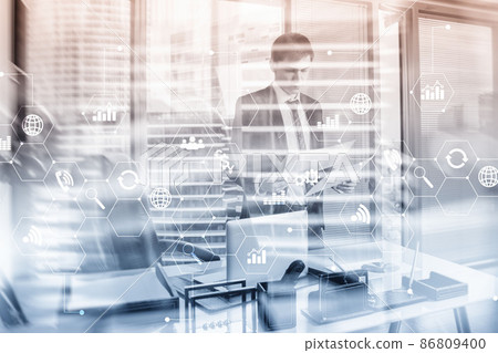 Diagram automation innovation concept. Against the background of young businessmen in the office Diagram automation innovation concept. Against the background of young businessmen in the office 86809400