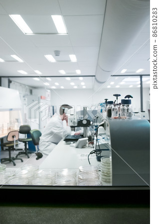 Scientists in the laboratory are developing vaccines against coronavirus Blurred photo 86810283