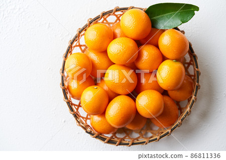 Kumquat in a basket Kumquat in a basket 86811336