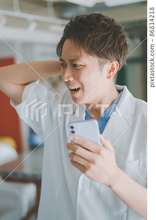 Doctor and smartphone Doctor and smartphone 86814218