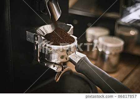 Coffee grinder grinding Coffee grinder grinding 86817857