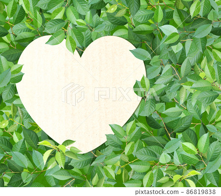 Horizontal background with green leaves. Summer nature banner and recycled paper heart-shaped label Horizontal background with green leaves. Summer nature banner and recycled paper heart-shaped label 86819838