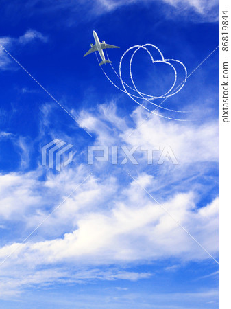 Vertical nature background with aircraft draw a heart in the sky. Flight route of aircraft in shape of a heart 86819844