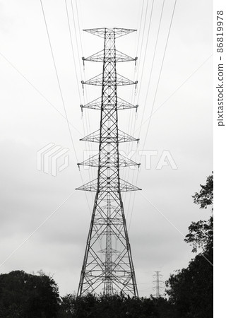 High voltage pole with rain clouds background High voltage pole with rain clouds background 86819978