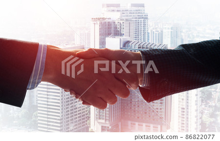 Close-up of the handshake of businessmen. Close-up of the handshake of businessmen. 86822077