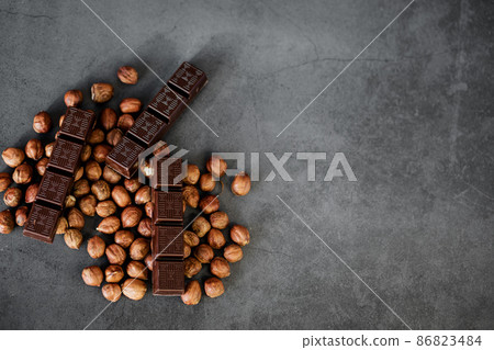 dark chocolate with hazelnuts 86823484