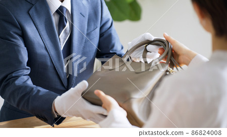 評估師和客戶評估袋子 86824008