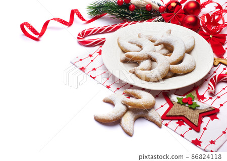 Christmas and New Year symbols and attributes of winter holidays - candy, cookies, pine cone Christmas and New Year symbols and attributes of winter holidays - candy, cookies, pine cone 86824118