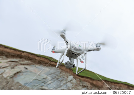 Flying drone taking picture of glacier lagoon in Tibet,China Flying drone taking picture of glacier lagoon in Tibet,China 86825067