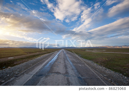 High altitude mountain landscape under blue sky High altitude mountain landscape under blue sky 86825068