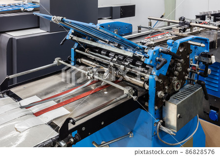 folding equipment in modern printing house 86828576