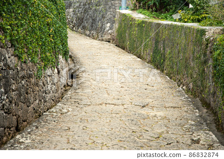 Beautiful cobblestone road in Kinjo Town, Naha City Beautiful cobblestone road in Kinjo Town, Naha City 86832874