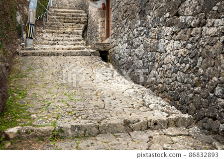Beautiful cobblestone road in Kinjo Town, Naha City Beautiful cobblestone road in Kinjo Town, Naha City 86832893