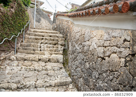 Beautiful cobblestone road in Kinjo Town, Naha City 86832909