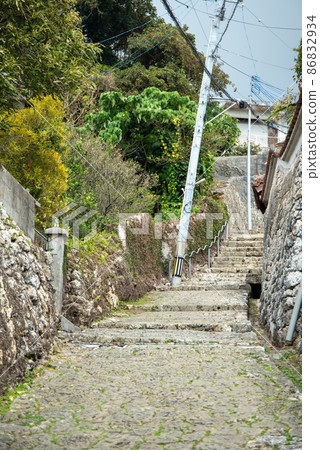 Beautiful cobblestone road in Kinjo Town, Naha City Beautiful cobblestone road in Kinjo Town, Naha City 86832934