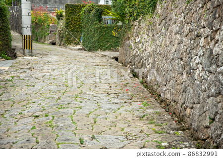 Beautiful cobblestone road in Kinjo Town, Naha City Beautiful cobblestone road in Kinjo Town, Naha City 86832991