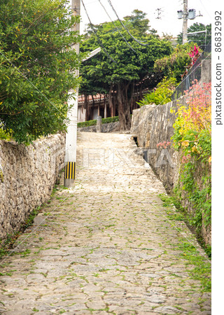 Beautiful cobblestone road in Kinjo Town, Naha City Beautiful cobblestone road in Kinjo Town, Naha City 86832992